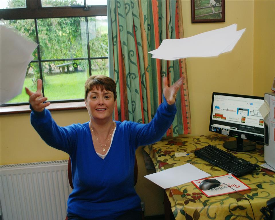 woman in office using Herdwatch desktop paperwork