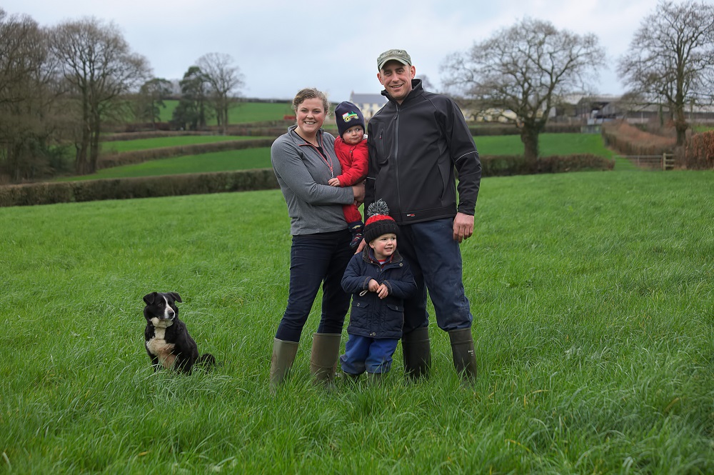 Andy Broomfield family smiling in field
