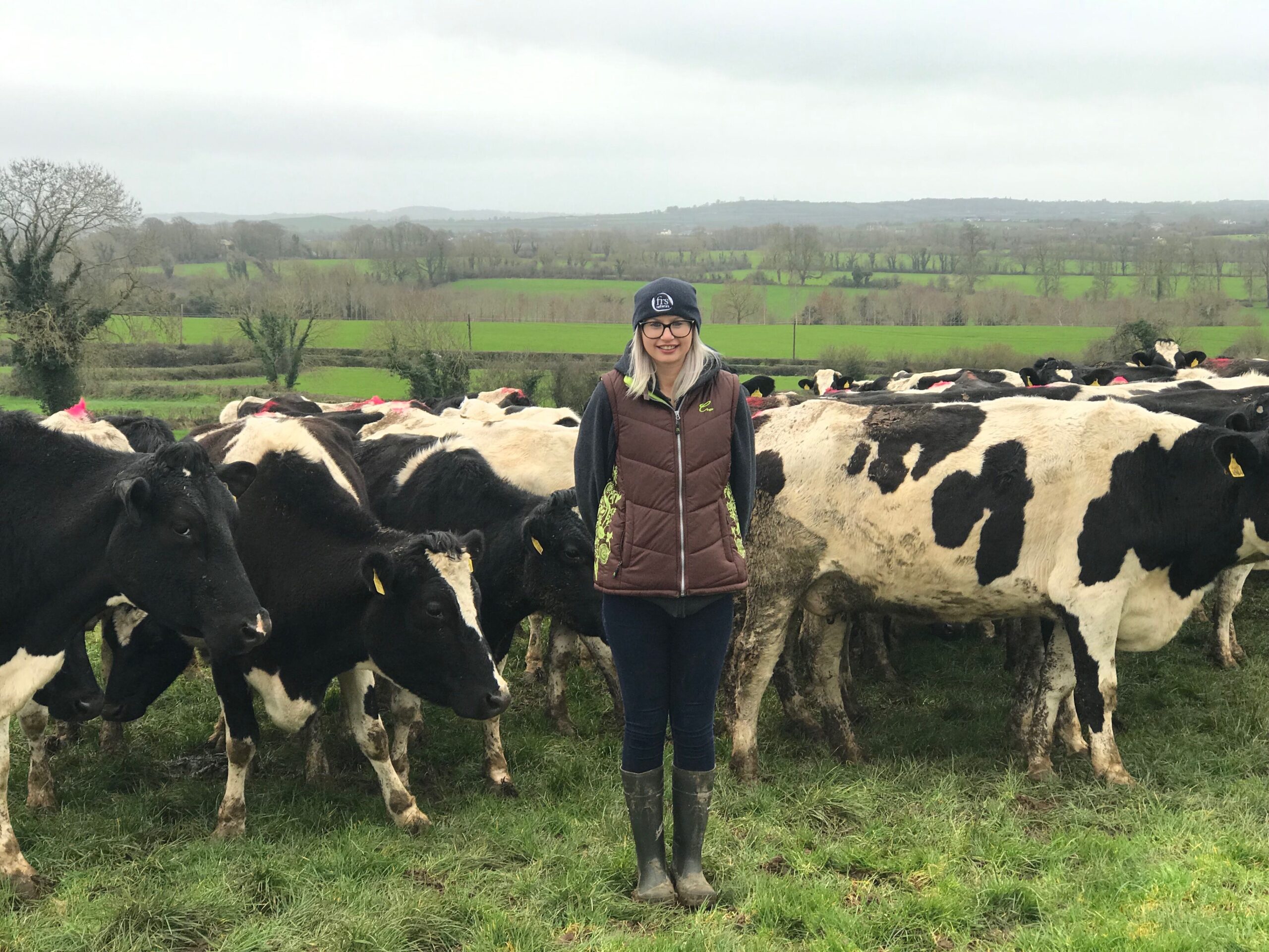 louise crowley in field with cows